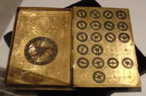 Cryptography. 16th century French cipher machine in the shape of a book with the arms of Henry II.