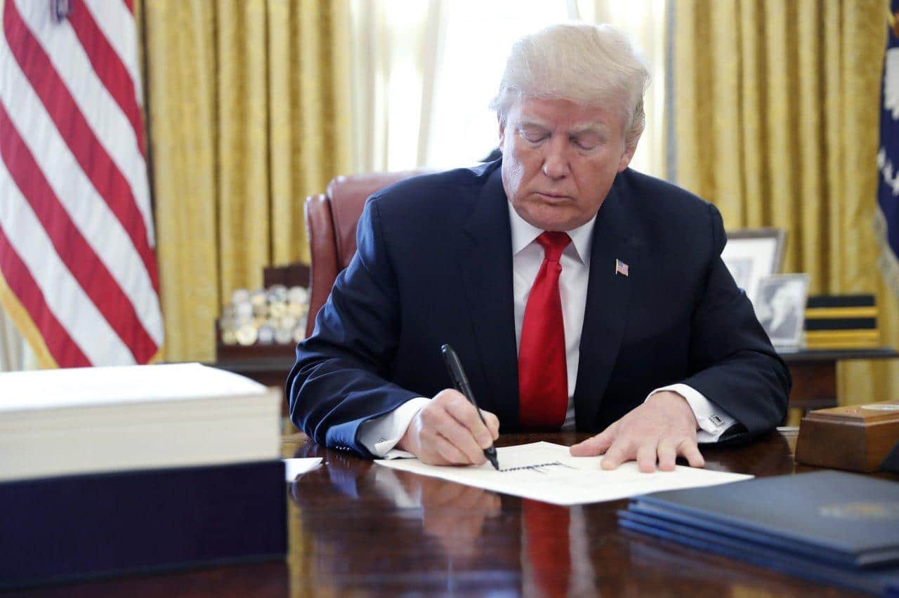 President Donald J Trump Signing Laws Image via Wall Street Journal