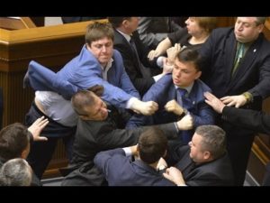 Picture of people in suits fighting